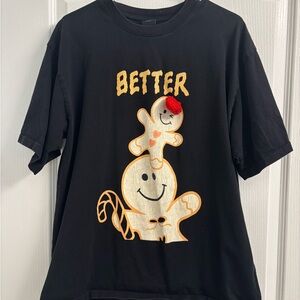 Black Graphic Tee with Gingerbread Design